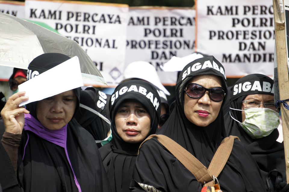 A Muslim group takes to the streets of Bandung in a demonstration last month. (Antara Photo/Agus Bebeng)