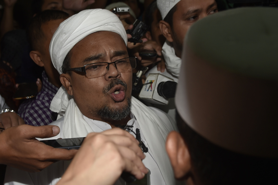 The Jakarta Police will summon two witnesses for questioning in the pornography investigation against Islamic Defenders Front (FPI) leader Rizieq Shihab on Tuesday (16/05). (Antara Photo/Puspa Perwitasari)