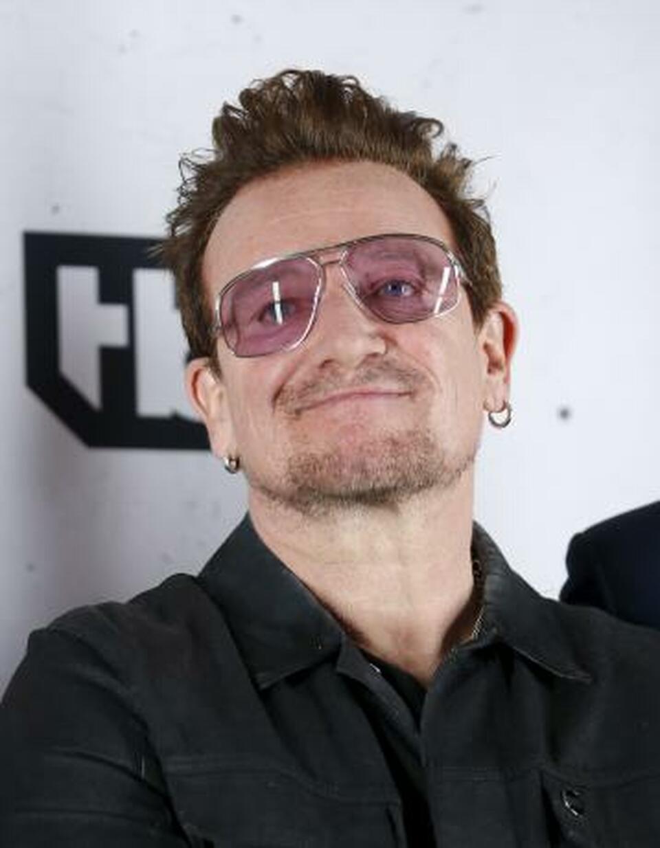 Musician Bono from U2 poses backstage after the band was presented with the iHeartRadio Innovator Award at the 2016 iHeartRadio Music Awards in Inglewood, California, US on April 3, 2016. (Reuters Photo/Danny Moloshok/File Photo)