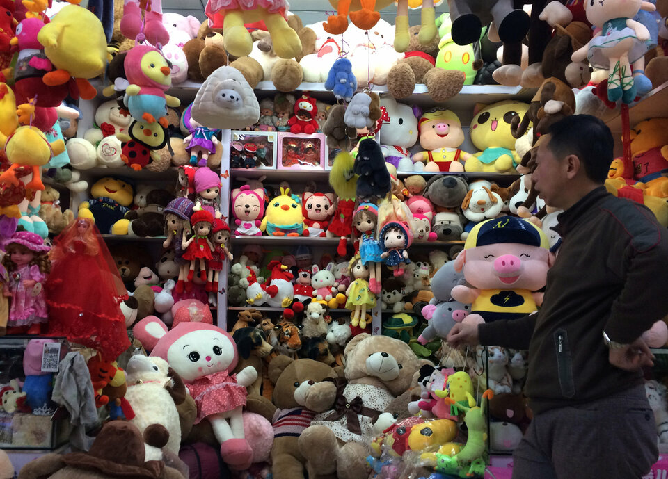 Tiny memory cards and fluffy teddy bears are among the most popular items in shops in Dandong, China. (Reuters Photo/Sue-Lin Wong)