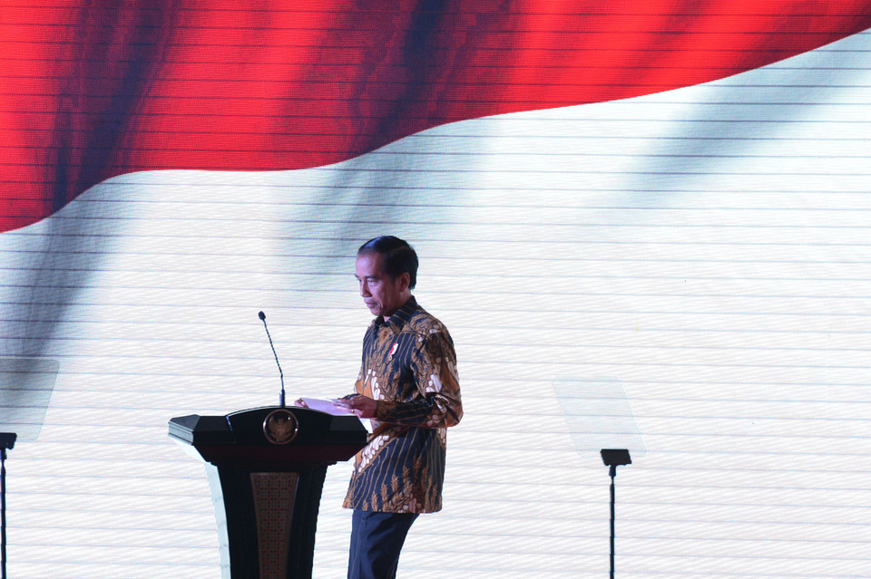 President Joko Widodo addresses the Hanura party congress on Wednesday night (21/12) in East Jakarta. (Antara Photo/Akbar Nugroho Gumay)