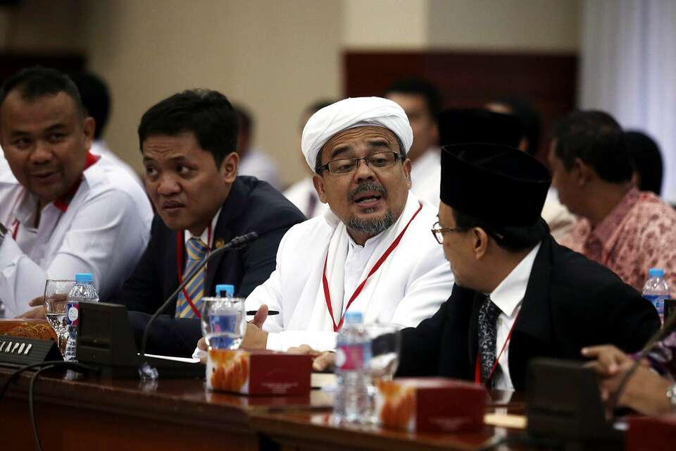 For weeks Rizieq has been fleeing police investigation. He is charged with engaging in pornographic WhatsApp chats, which is an offense under Indonesia's strict anti-pornography law. (SP Photo/Joanito De Saojoao)