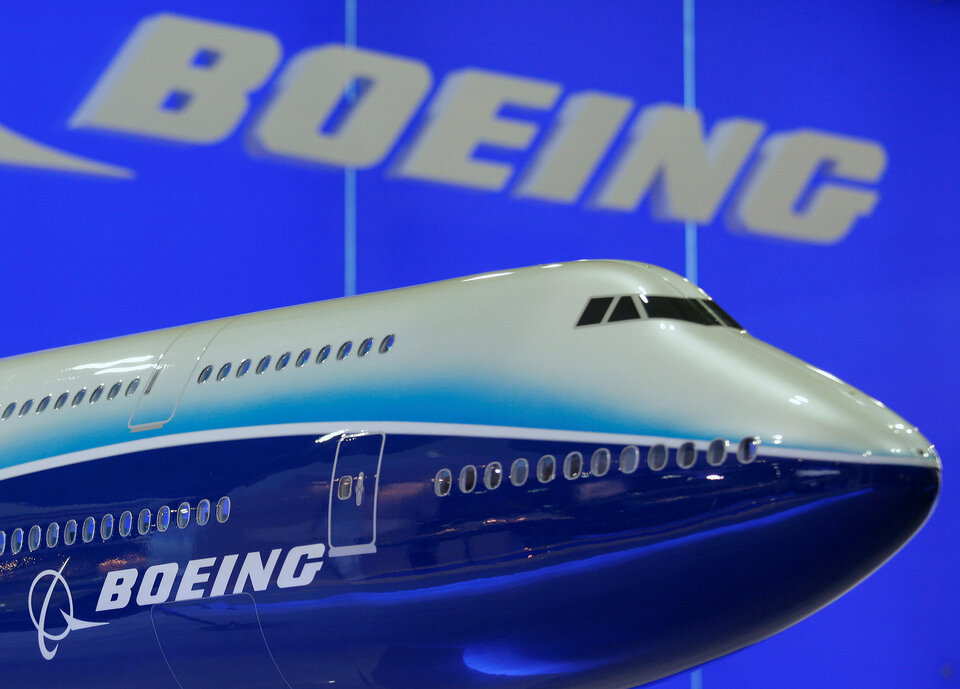 Boeing has looked at options 'from mild to wild' for the design of a proposed mid-market jet, a senior executive said, hinting at a breakthrough that industry sources say will create building blocks for future models. (Reuters Photo/Bobby Yip)