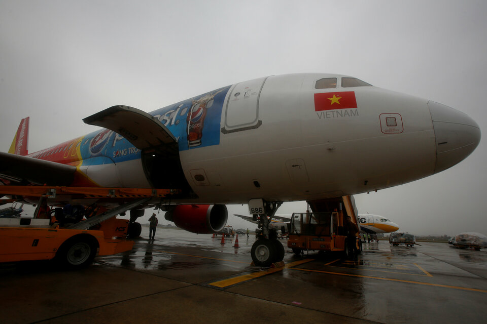 An airplane of Vietjet Air is seen before a flight at Noi Bai airport in Hanoi on Dec. 15, 2016. (Reuters Photo/Kham)