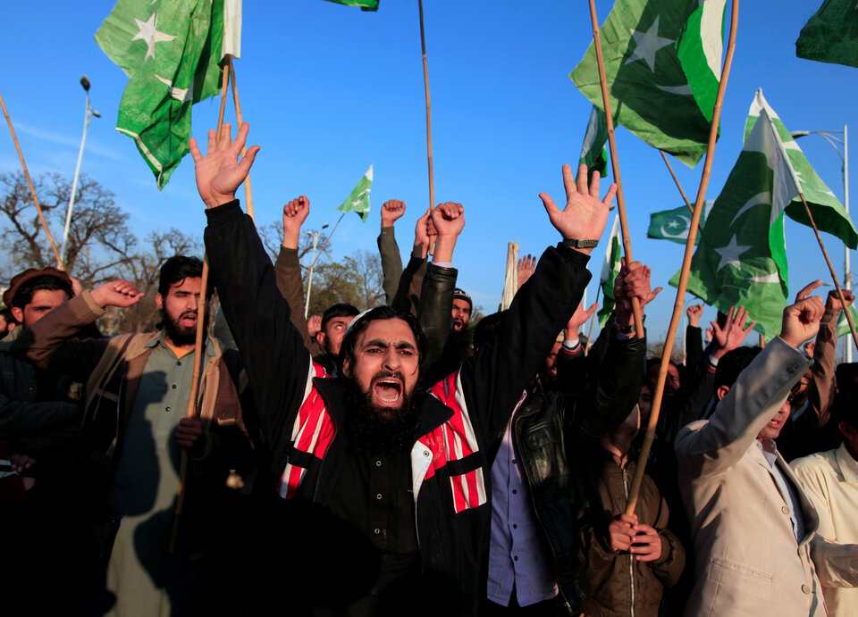 Supporters of Islamic charity organization Jamaat-ud-Dawa (JuD), chant slogans to condemn the house arrest of Hafiz Muhammad Saeed, chief of (JuD), during a demonstration in Islamabad, Pakistan, January 31, 2017. (Reuters Photo/Faisal Mahmood)