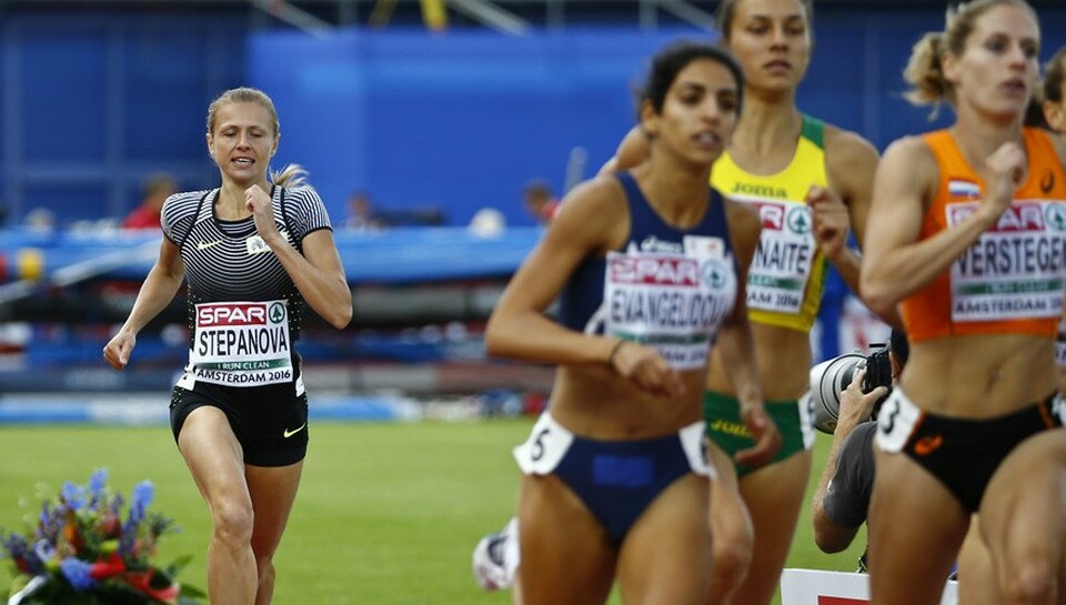 Yulia Stepanova, left, at the women's 800-meter qualifiers in Amsterdam last year. (Reuters Photo/Michael Kooren)