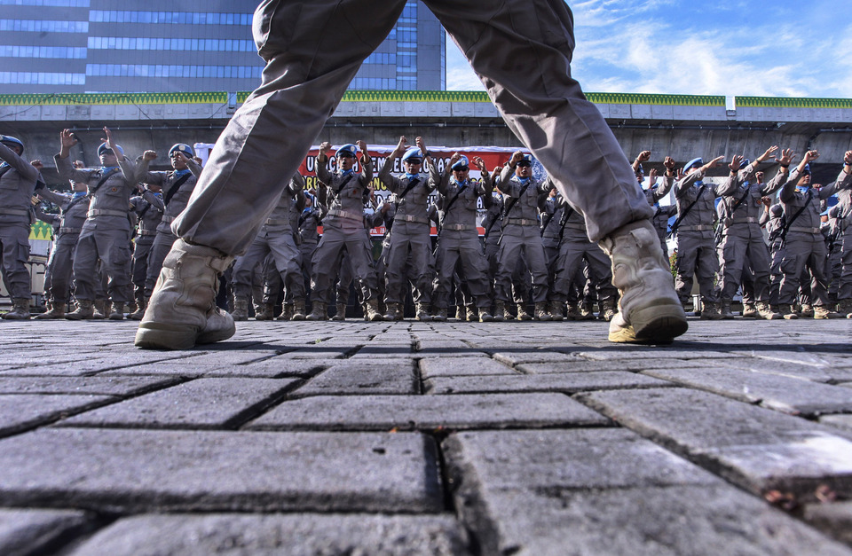 The Indonesian police's peacekeeping force before they depart for Sudan. (Antara Photo/Muhammad Adimaja)