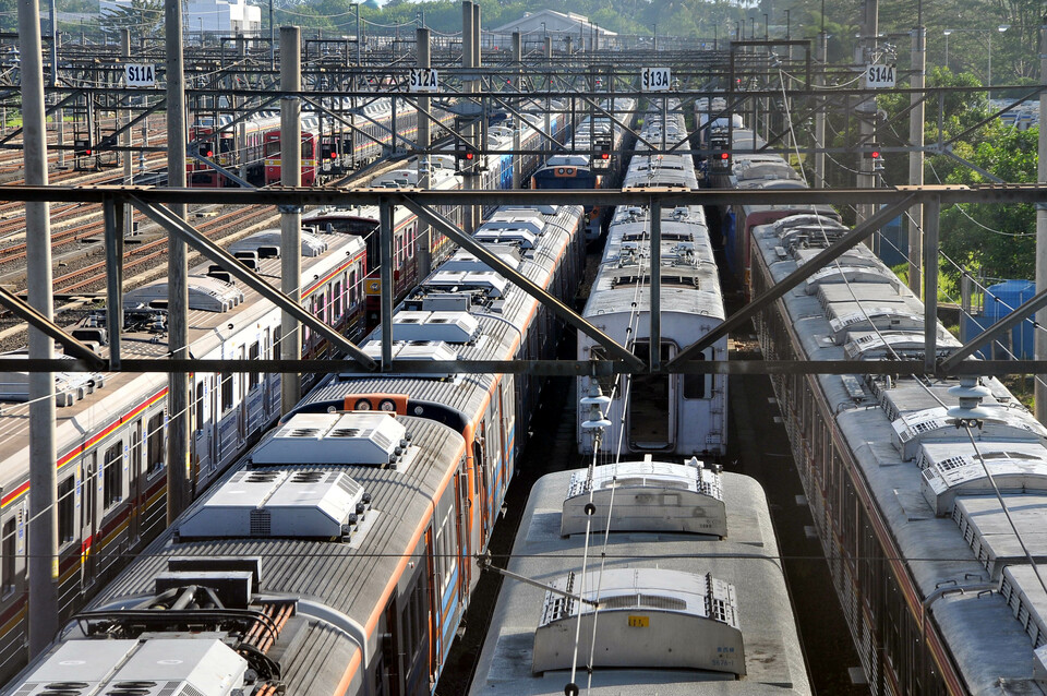 Trains parked at the Citayam depot in Depok, West Java, on Saturday (07/01). State-run rail operator Kereta Api Indonesia plans to replace 900 trains over the next three years as part of a fleet renewal program. It will replace 438 trains in 2017. (Antara Photo/Julius Satria Wijaya)