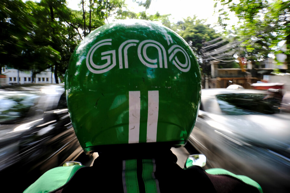 A GrabMotor driver on a street in Jakarta. (Reuters Photo/Beawiharta)