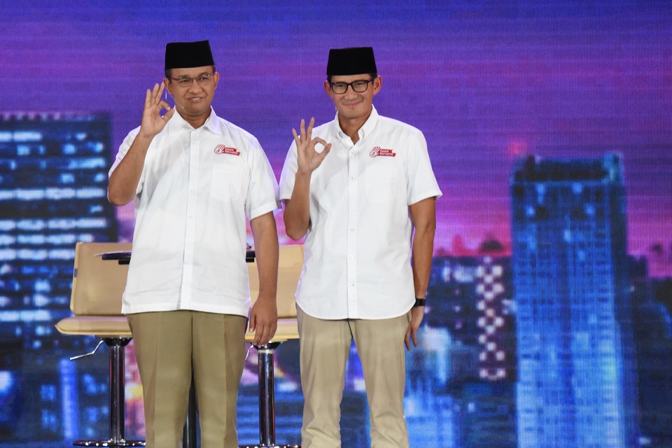 A lawyers' group has demanded that gubernatorial candidate pair Anies Baswedan and Sandiaga Uno publicly apologize for allegedly making false promises during their campaign. (Antara Photo/Akbar Nugroho Gumay)