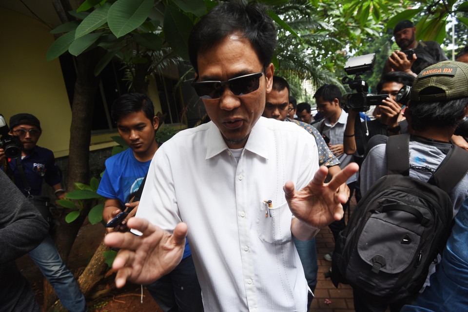 Islamic Defenders Front (FPI) spokesman Munarman plans to file a pretrial motion after Bali Police named him a suspect for allegedly insulting the traditions of the island's Hindu majority. (Antara Photo/Akbar Nugroho Gumay)