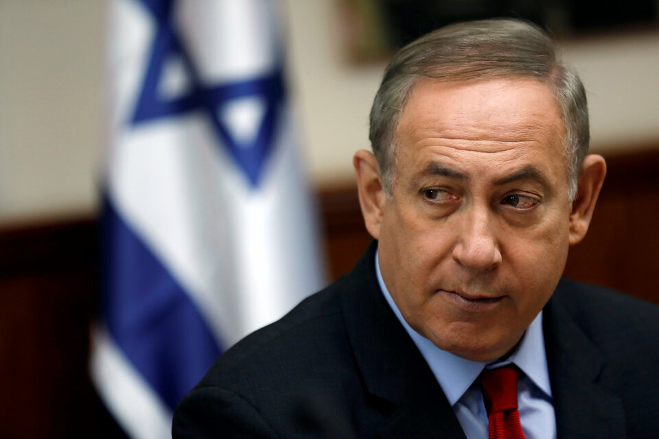 Prime Minister Benjamin Netanyahu's Likud party unanimously urged legislators in a non-binding resolution on Sunday (31/12) to effectively annex Israeli settlements built in the West Bank. (Reuters Photo/Amir Cohen)