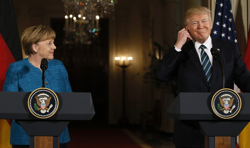 German Chancellor Angela Merkel looks on as US President Donald Trump smiles during their joint news conference in the East Room of the White House in Washington, US, March 17, 2017. (Reuters Photo/Jim Bourg)