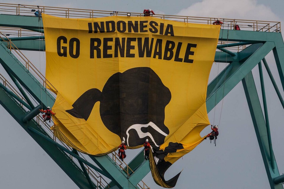 Providing the market with better quality and more consistent information about companies' climate strategies and preparedness would give institutional investors what they need to direct capital into the right areas, writes Daniel Klier, group general manager, group head of strategy and global head of sustainable finance at the HSBC Group. (Photo courtesy of Greenpeace Indonesia/Ulet Ifansasti)