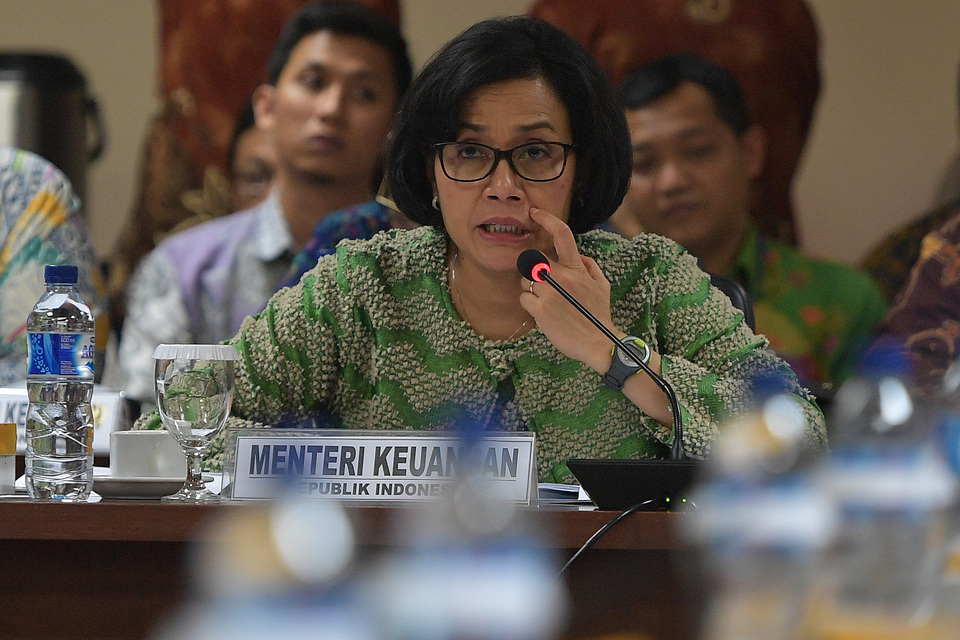 Minister of Finance Sri Mulyani Indrawati has prohibited ministry officials from discussing tax-related matters with taxpayers outside the office. (Antara Photo/Sigid Kurniawan)