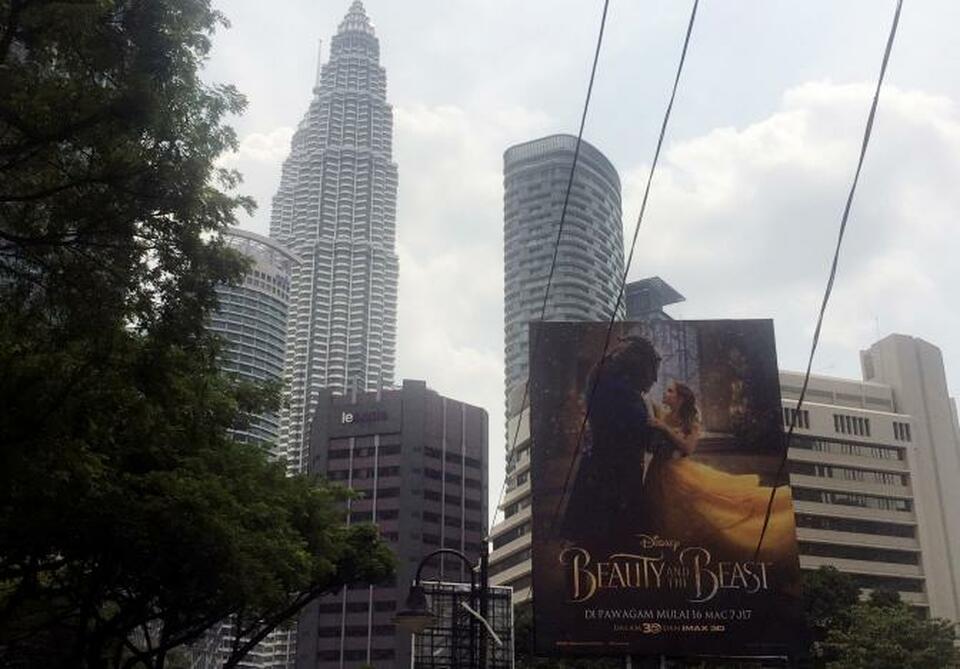 A Beauty and the Beast poster in downtown Kuala Lumpur, Malaysia March 14, 2017. (Reuters Photo/Angie Teo)