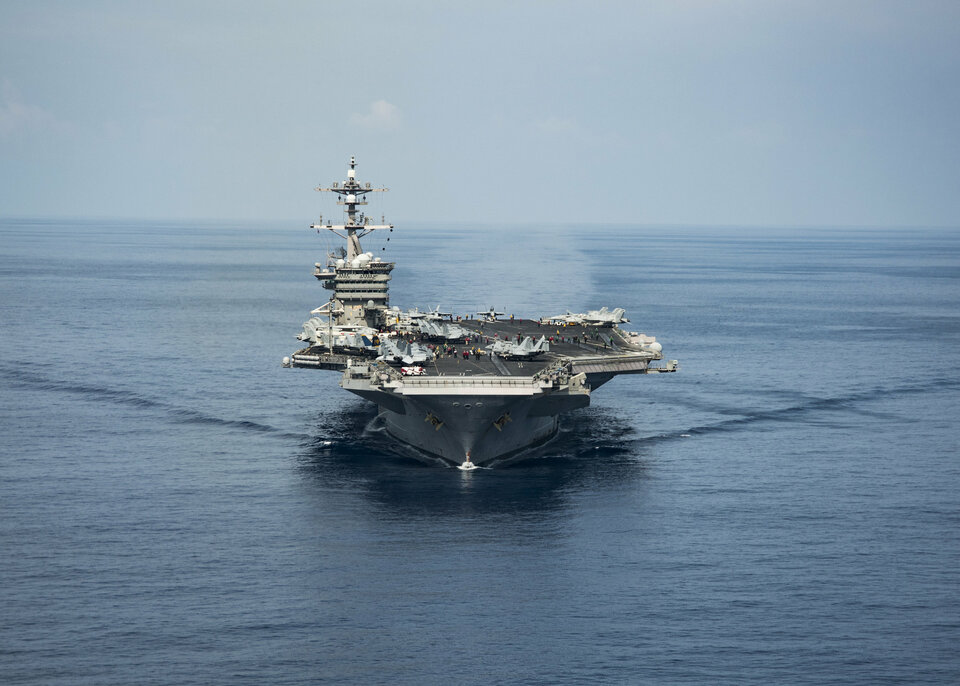 The aircraft carrier USS Carl Vinson transits the South China Sea while conducting flight operations in April. (Reuters Photo/US Navy)