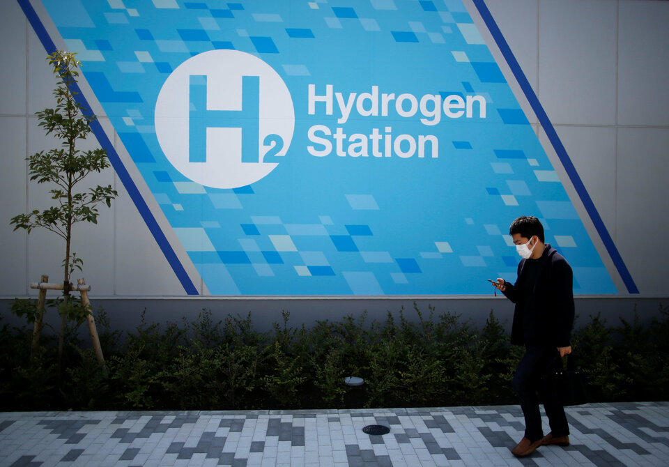 A man walks past a hydrogen station in Tokyo on Monday (24/04). (Reuters Photo/Issei Kato)