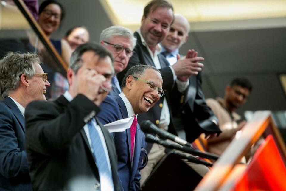 Dean Baquet (center), executive editor of The New York Times, celebrates the announcement of the 2017 Pulitzer Prizes in The Times office in New York, US, April 10, 2017. (Photo by Sam Hodgson/Courtesy The New York Times/Handout via Reuters)