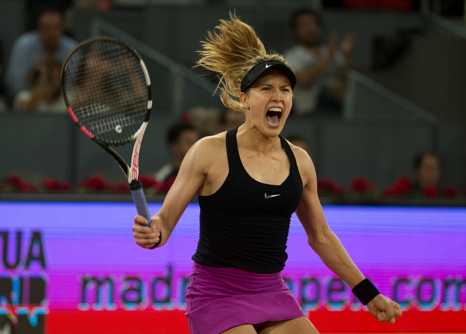 Eugenie Bouchard pulled off her first win over Maria Sharapova with a 7-5 2-6 6-4 triumph in the Madrid Open on Monday (08/05) in a thrilling contest full of tension after the Canadian had called the Russian a cheater following her doping ban. (Reuters Photo/Sergio Perez)