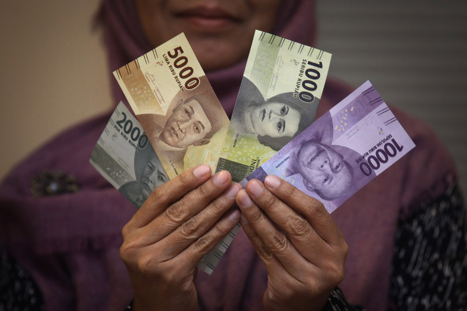 Bank Indonesia expects the rupiah to weaken marginally against the dollar next year while the country's economic growth rate should be slightly higher, its governor said on Tuesday (06/06).
 (Antara Photo/Andreas Fitri Atmoko)