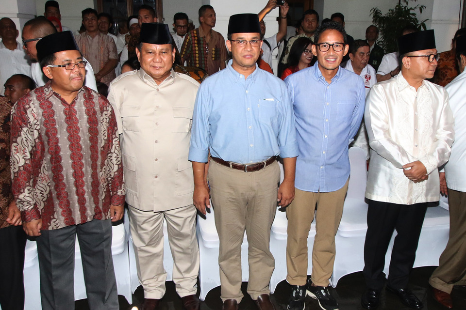 File photo: In this photo dated May 5, 2017, Prabowo Subianto, second left, poses for a photo with elected Jakarta Governor Anies Baswedan and Sandiaga Uno in Jakarta. (Antara photo)