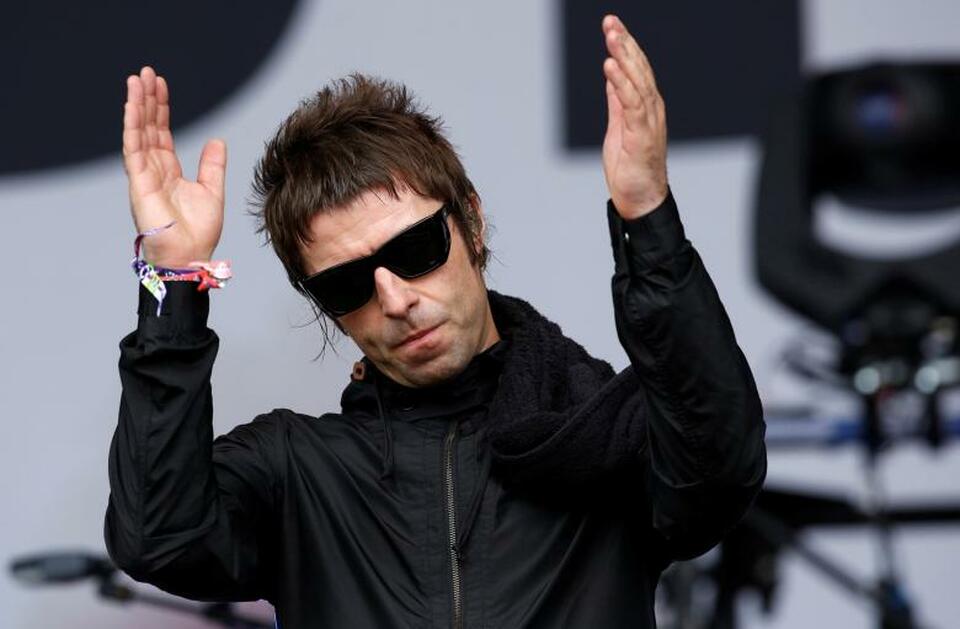 Liam Gallagher performs with his band Beady Eye during the Glastonbury music festival at Worthy Farm in Somerset, June 28, 2013. (Reuters Photo/Olivia Harris/File Photo)