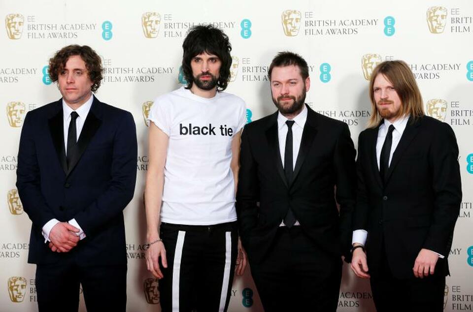 The band Kasabian pose backstage after performing at the British Academy of Film and Arts (BAFTA) awards ceremony at the Royal Opera House in London February 8, 2015. (Reuters Photo/Suzanne Plunkett/File Photo)