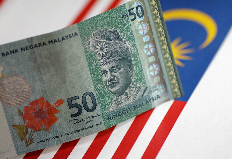 Malaysia's central bank said on Wednesday (09/08) the introduction of ringgit futures on the Singapore Stock Exchange and the Intercontinental Exchange, and their offshore trading is inconsistent with Malaysia's policies. (Reuters Photo/Thomas White)