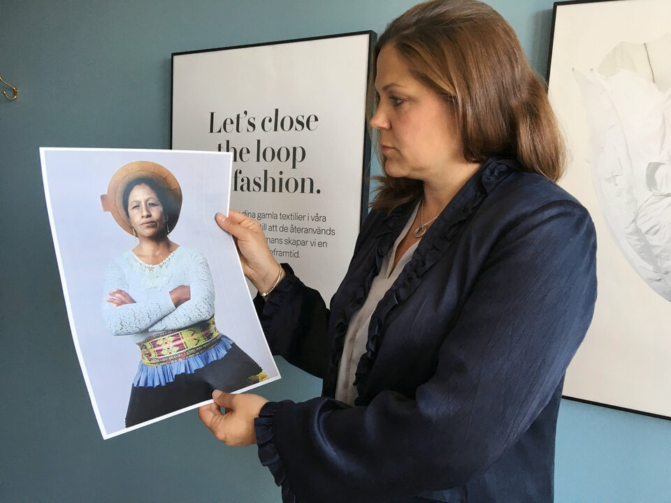 H&M Foundation Global manager Diana Amini poses with portraits of women on the Foundation 500 list of female entrepreneurs in emerging markets in Stockholm on June 2. (Reuters Photo/Anna Ringstrom)