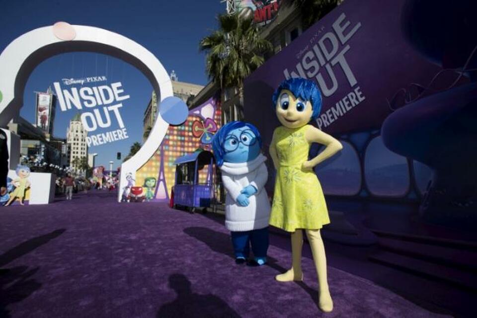 "Joy" and "Sadness", characters of the animation film "Inside Out", pose at its premiere at El Capitan theatre in Hollywood, California, US on June 8, 2015. (Reuters Photo/Mario Anzuoni/File Photo)