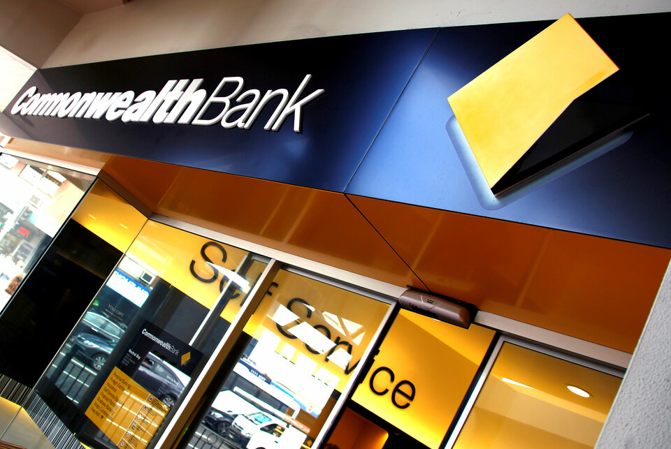The logo of the Commonwealth Bank of Australia (CBA) is displayed outside a branch in Sydney in March 2016. (Reuters Photo/David Gray)