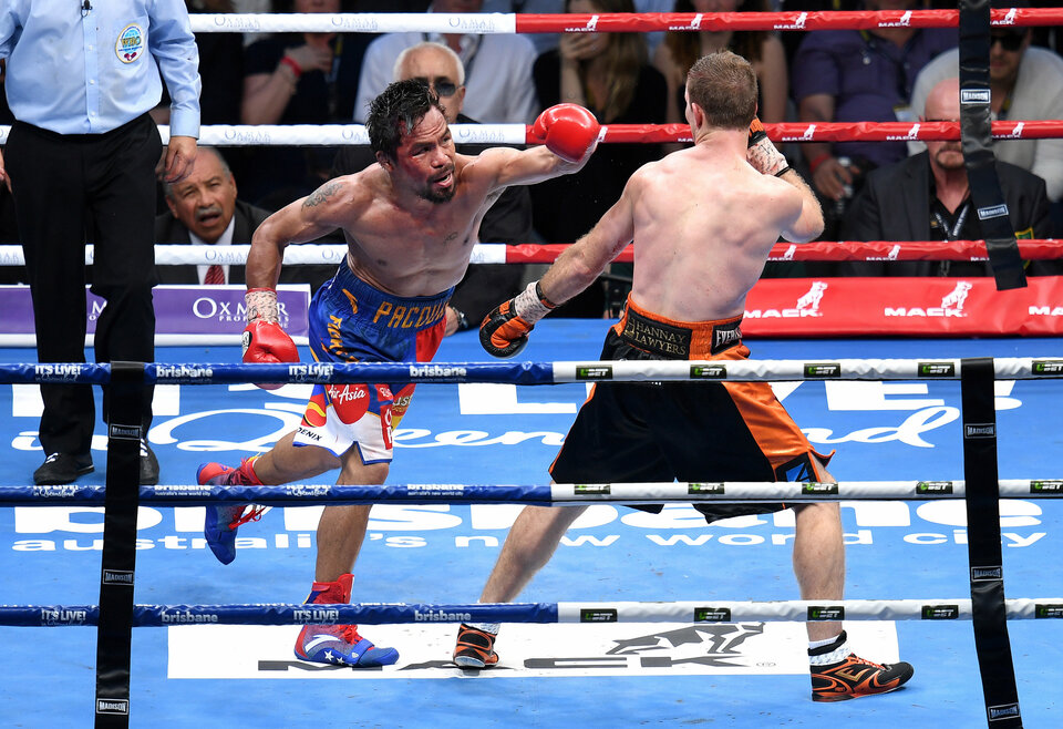 Manny Pacquiao of the Philippines swings and misses during his loss to Jeff Horn of Australia on July 2. (Reuters Photo/AAP-Dan Peled)