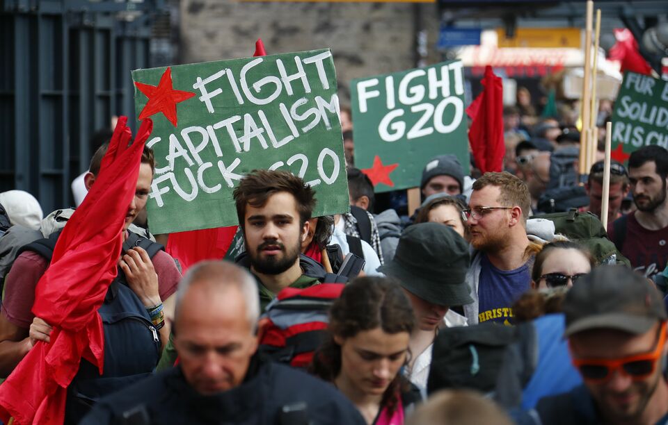 'Welcome to Hell.' That's the greeting for US President Donald Trump and other world leaders from anti-capitalist protesters in Hamburg who aim to disrupt the G-20 summit, already rife with tensions over trade and climate change. (Reuters Photo/Fabrizio Bensch)