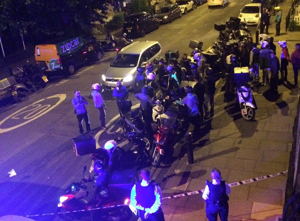 Emergency response following an acid attack in London on Thursday evening (13/07) seen in this picture obtained from social media. (Reuters Photo/Sarah Cobbold)
