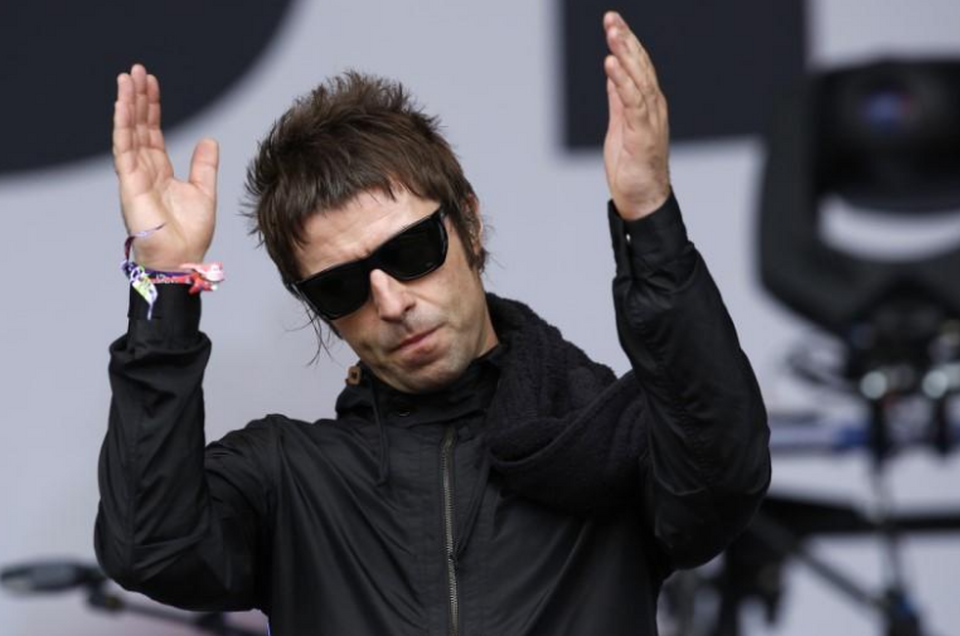 Liam Gallagher performs with his band Beady Eye during the Glastonbury music festival at Worthy Farm in Somerset, June 28, 2013. (Reuters Photo/Olivia Harris)