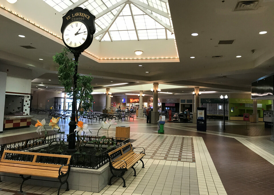 A clock tower is seen in the mostly vacant St. Lawrence Centre Mall in Massena, New York, on June 19. (Reuters Photo/Jonathan Spicer)