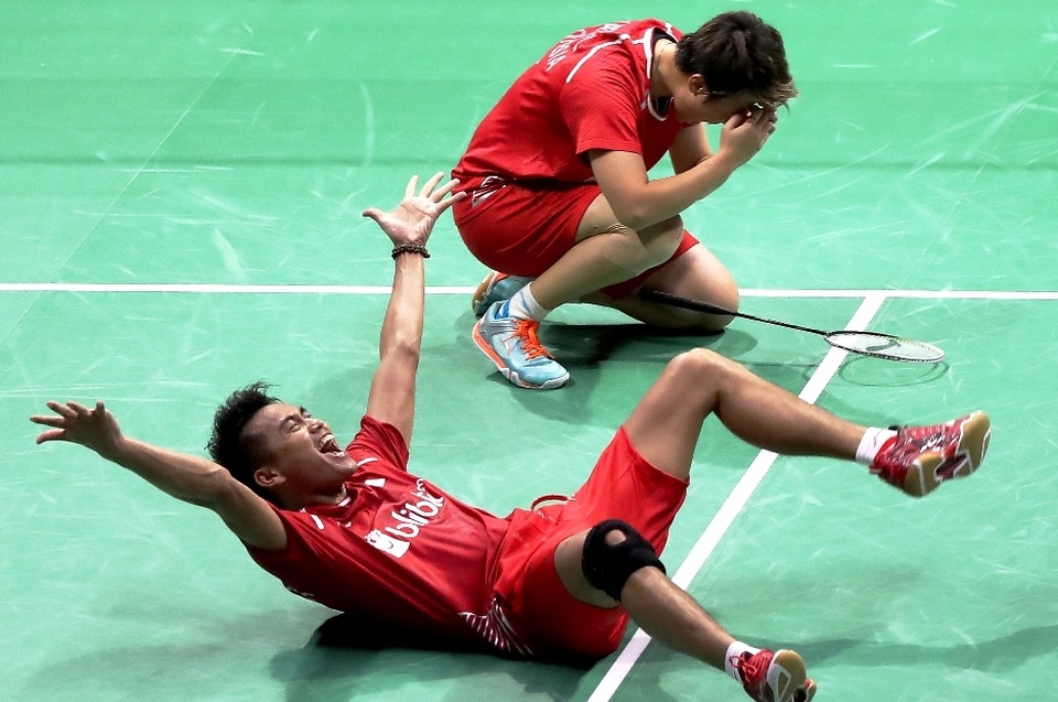 Tontowi Ahmad and Liliyana Natsir celebrate Sunday's (28/08) win. (Photo courtesy of the Badminton World Federation)