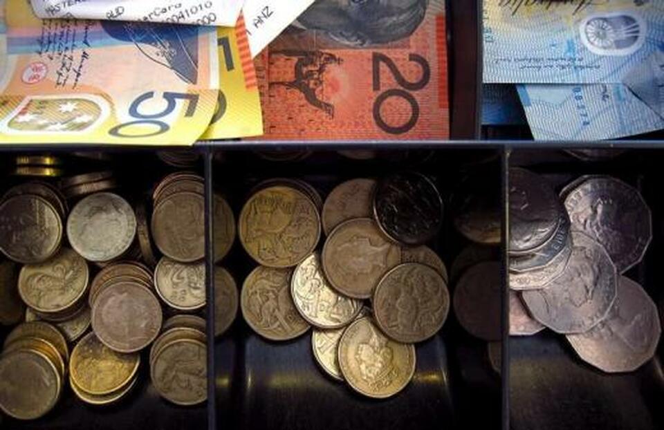Australian dollar notes and coins in a cash register at a store in Sydney, Australia, on Feb. 11, 2016. (Reuters Photo/David Gray)