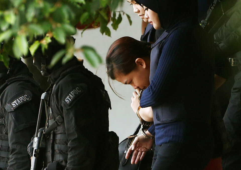 Two women accused of assassinating the estranged half-brother of North Korean leader Kim Jong-un with a banned nerve agent pleaded not guilty at the start of a high-profile murder trial in a Malaysian court on Monday (02/10). (Reuters Photo/Lai Seng Sin)