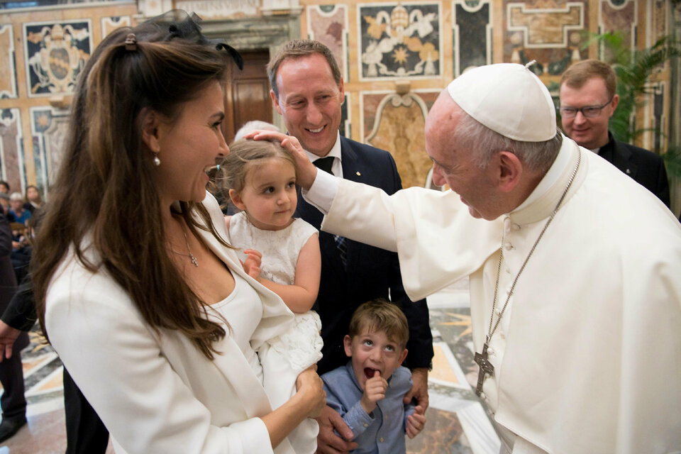 Pope Francis caresses a child during a special audience with participants to the World Congress "Child Dignity in the Digital World" at the Vatican, October 6, 2017. (Reuters Photo/Osservatore Romano)