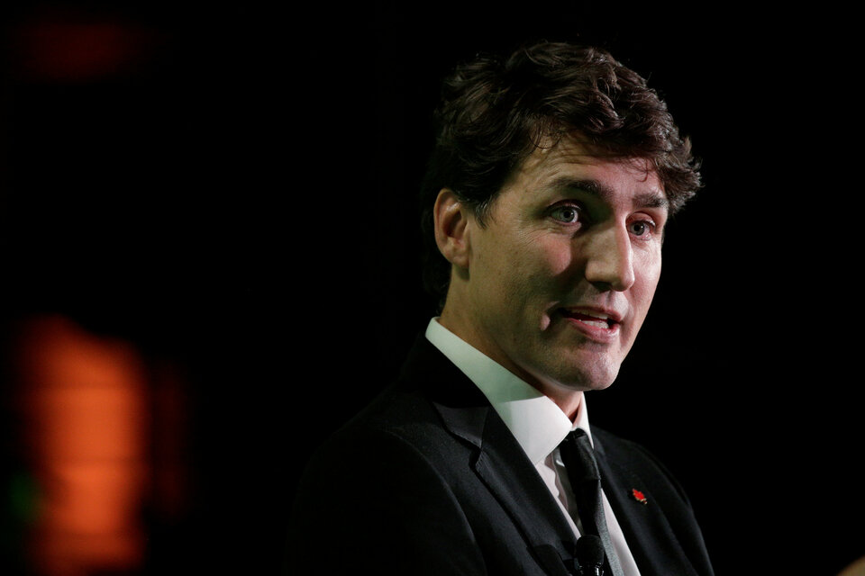 Boys need to be raised to be feminists as much as girls because 'our sons have the power and the responsibility to change our culture of sexism,' Canada's Prime Minister Justin Trudeau wrote in an essay published on Wednesday (11/10). (Reuters Photo/Joshua Roberts)
