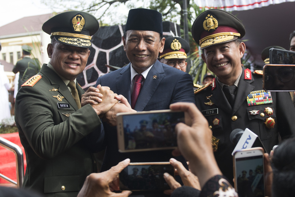 Indonesia's Chief Security Minister Wiranto, center, with TNI Chief Gatot Nurmantyo, left, and Police Chief Tito Karnavian at a ceremony for Pancasila Sanctity Day on Oct. 1, 2017. (Antara Photo/Rosa Panggabean)