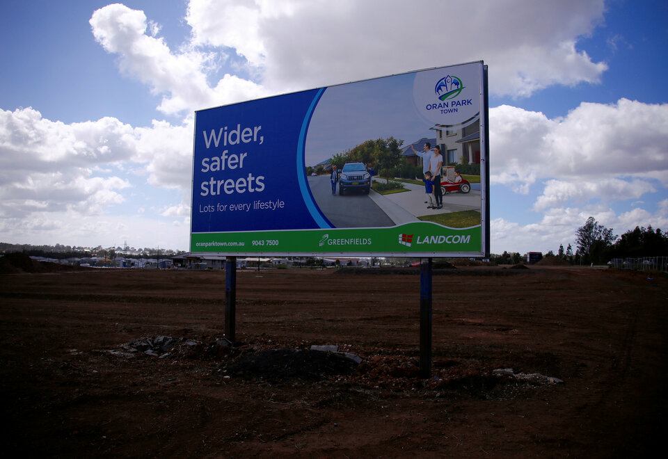 A promotional sign is displayed at a new housing development in the western Sydney suburb of Oran Park on Oct. 21. (Reuters Photo/David Gray)