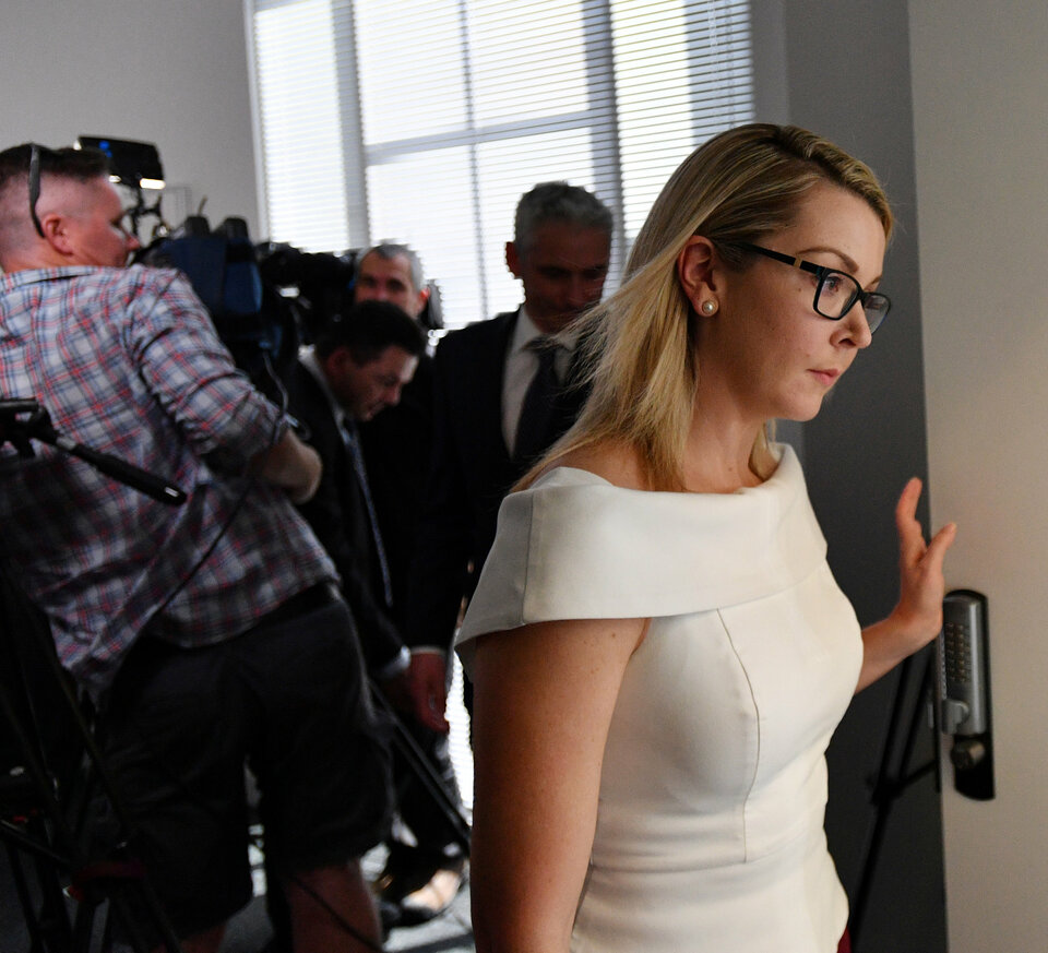 Nick Xenophon Team (NXT) Senator Skye Kakoschke-Moore leaves after announcing her resignation at a NEWs conference at her office in Adelaide, November 22, 2017.  (Reuters Photo/AAP)