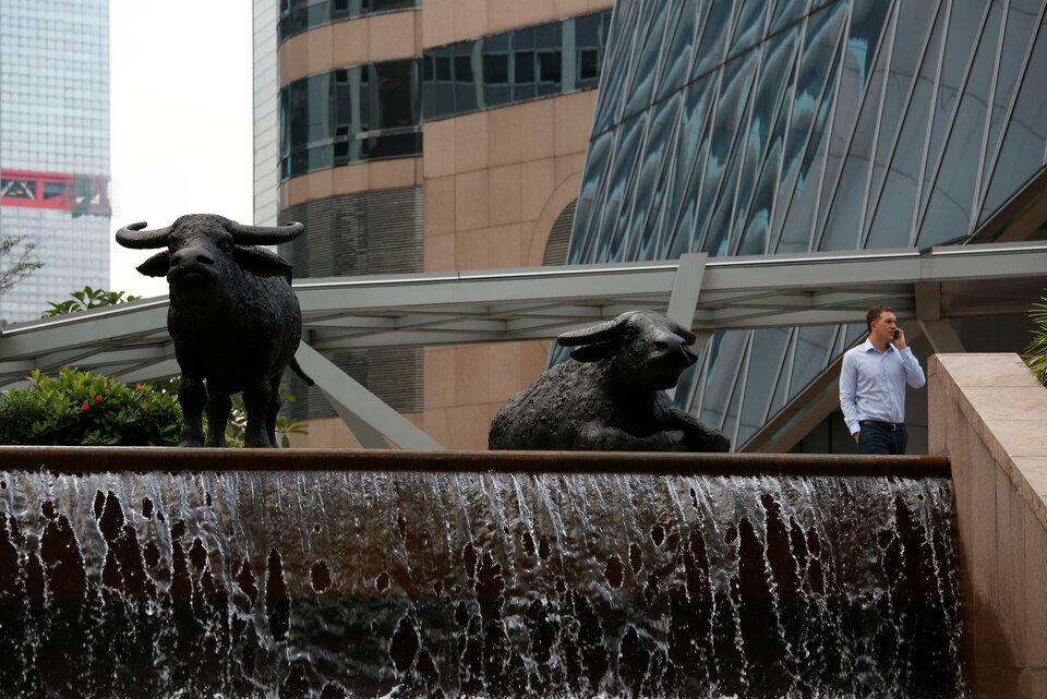 Sculptures of buffalos are displayed outside the Hong Kong Exchanges at the financial Central district in Hong Kong, China November 23, 2017.    (Reuters Photo/Bobby Yip)
