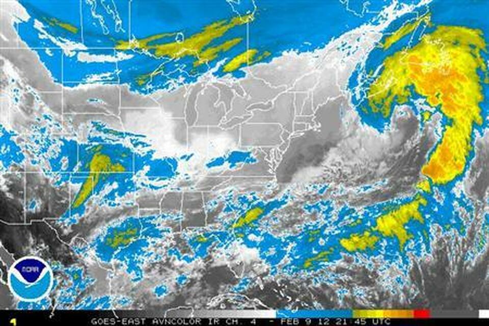 Storm systems are seen over the United States in an infrared satellite photo taken on Feb. 9, 2012. (Reuters Photo/NOAA)