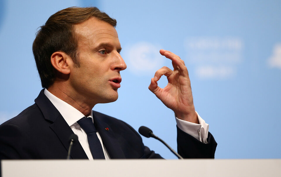 French President Emmanuel Macron will next week press rich countries to increase climate financing and urge investors worldwide to turn their backs on polluters in a bid to accelerate efforts to combat global warming. (Reuters Photo/Wolfgang Rattay)