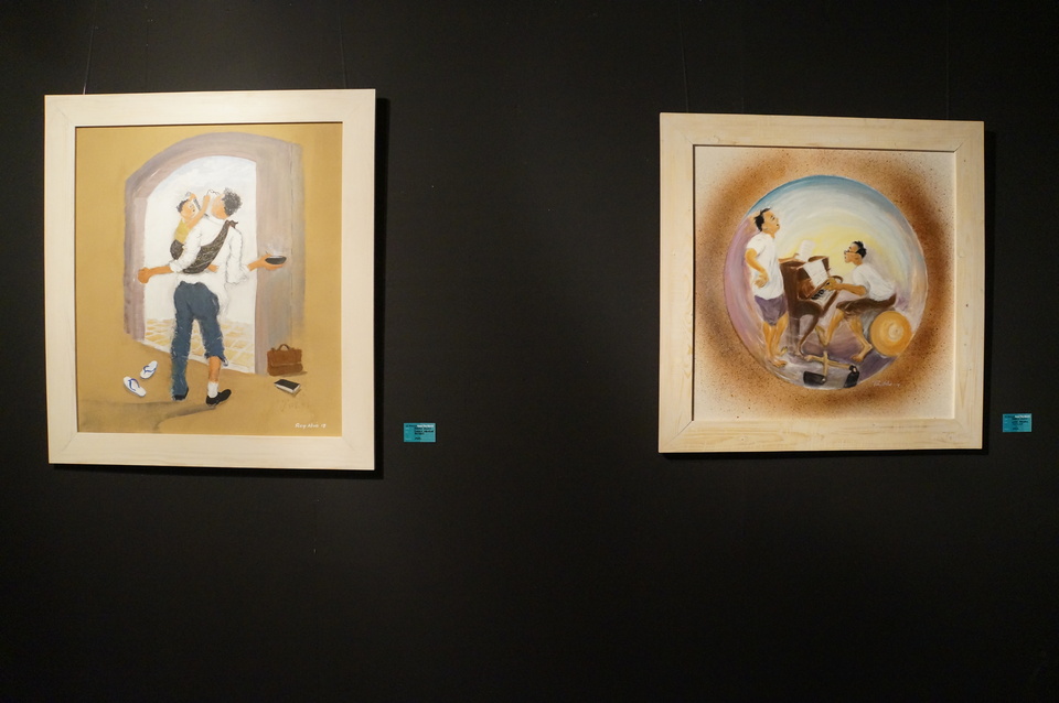 Left to right, 'Tugas Penting' (Important Chore) and 'Usai Panen' (After the Harvest) by artist, architect and photographer Reny Alwi at the 'Artpression' exhibition in Taman Ismail Marzuki, Jakarta, on Monday (16/01). (JG Photo/Dhania Sarahtika)