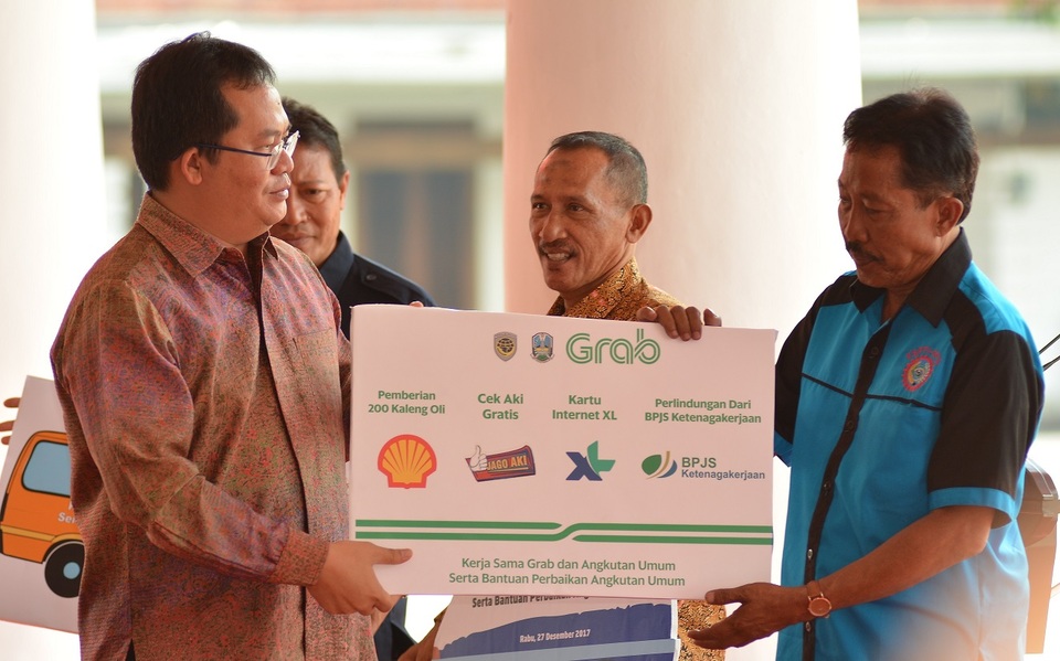 Online ride-hailing service and mobile payment platform Grab, renowned in Southeast Asia, held a corporate social responsibility program in Surabaya, East Java, on Thursday (04/01). (Photo courtesy of Grab)